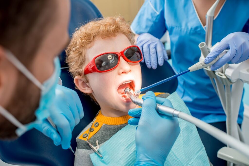 Smiling Child being treated for speech impediment